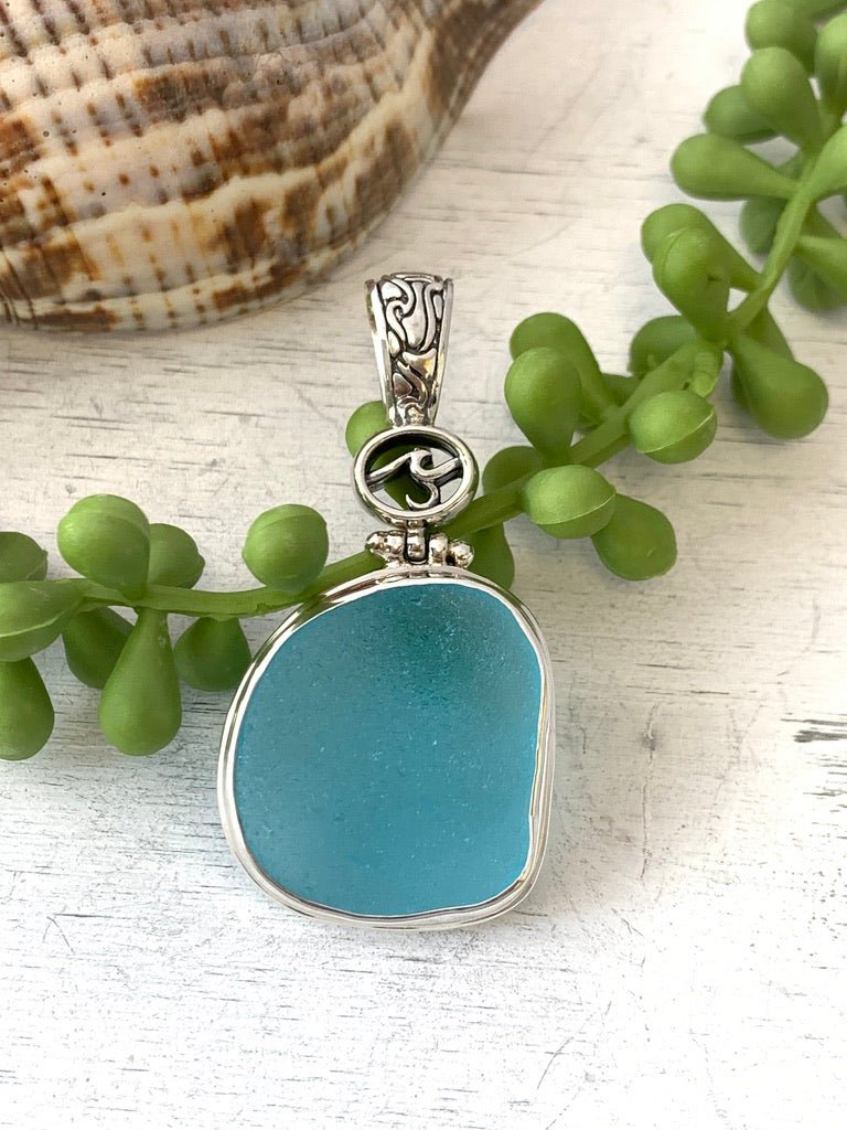 Elegant Caribbean Sea Glass Pendant with Hand-carved bail and logo - Ocean Soul
