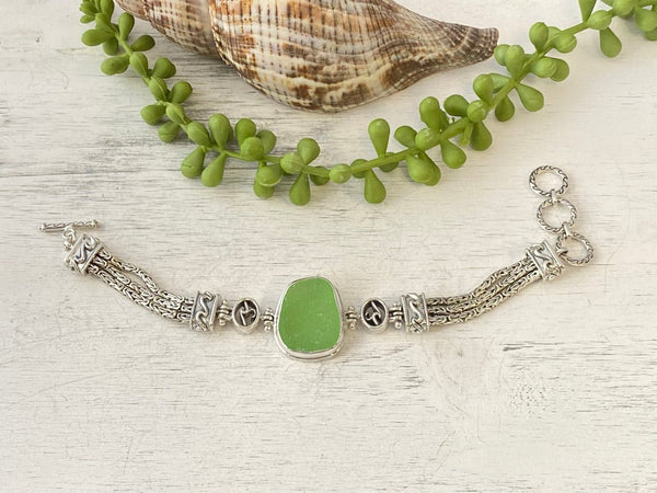 Lavishing Light Green Sea Glass on the Adjustable Triple Tigertail Bracelet - Ocean Soul