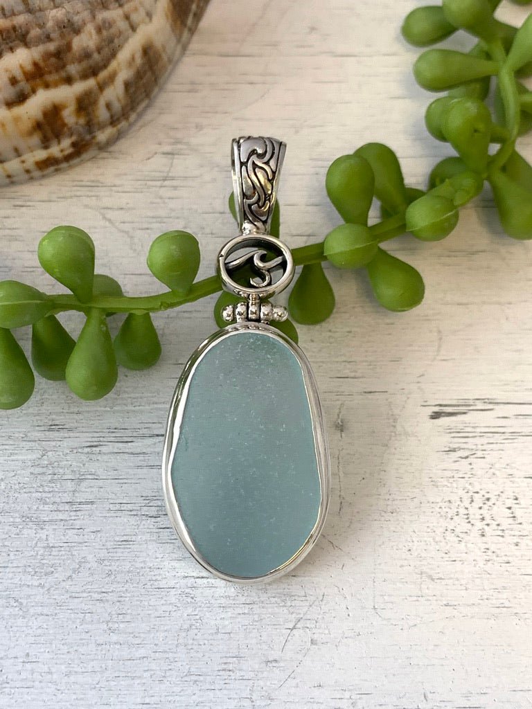 Light Blue Sea Glass Pendant with Hand-carved bail and logo - Ocean Soul