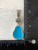Pear-Shaped Caribbean Glass Pendant with Hand-carved bail and logo - Ocean Soul