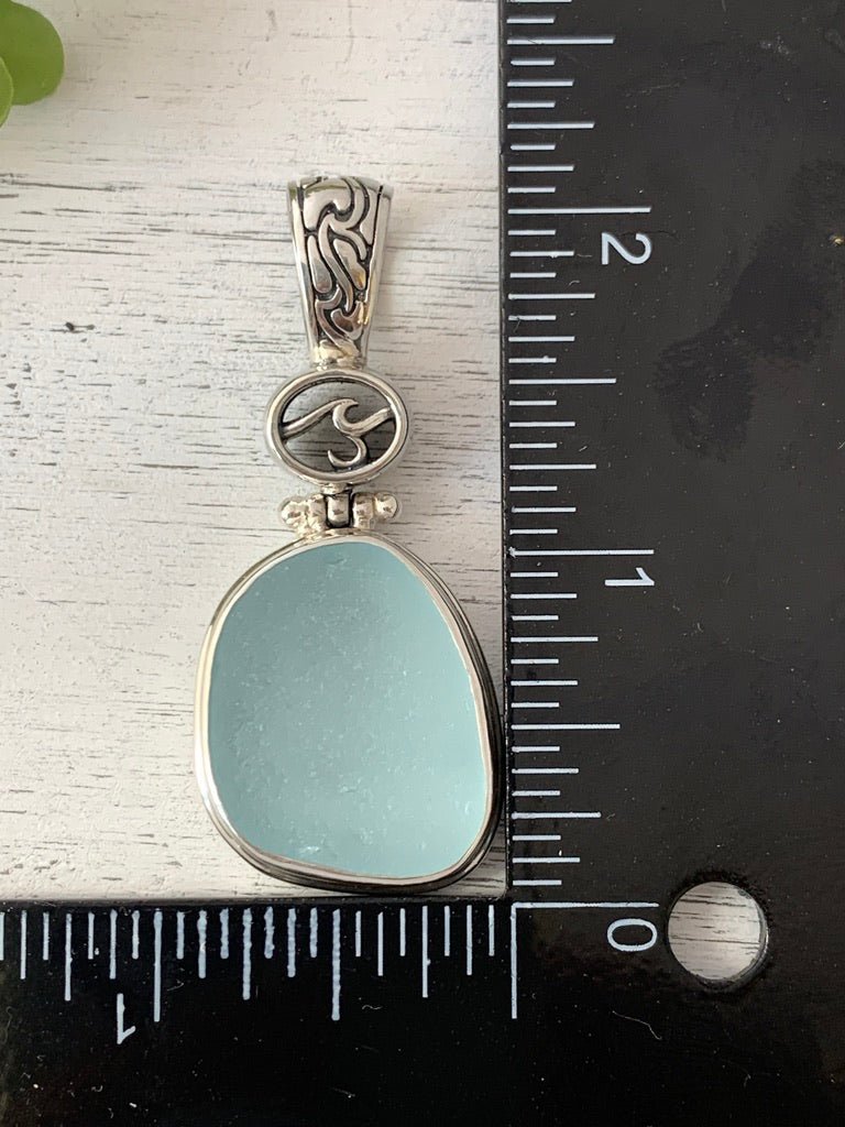 Powder Light Blue Sea Glass Pendant with Hand-carved bail and logo - Ocean Soul