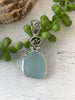 Powder Light Blue Sea Glass Pendant with Hand-carved bail and logo - Ocean Soul