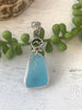 Striking Caribbean Sea Glass Pendant with Hand-carved bail and logo - Ocean Soul