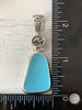 Striking Caribbean Sea Glass Pendant with Hand-carved bail and logo - Ocean Soul