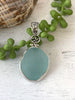 Summery Light Blue Sea Glass Pendant with Hand-carved bail and logo - Ocean Soul
